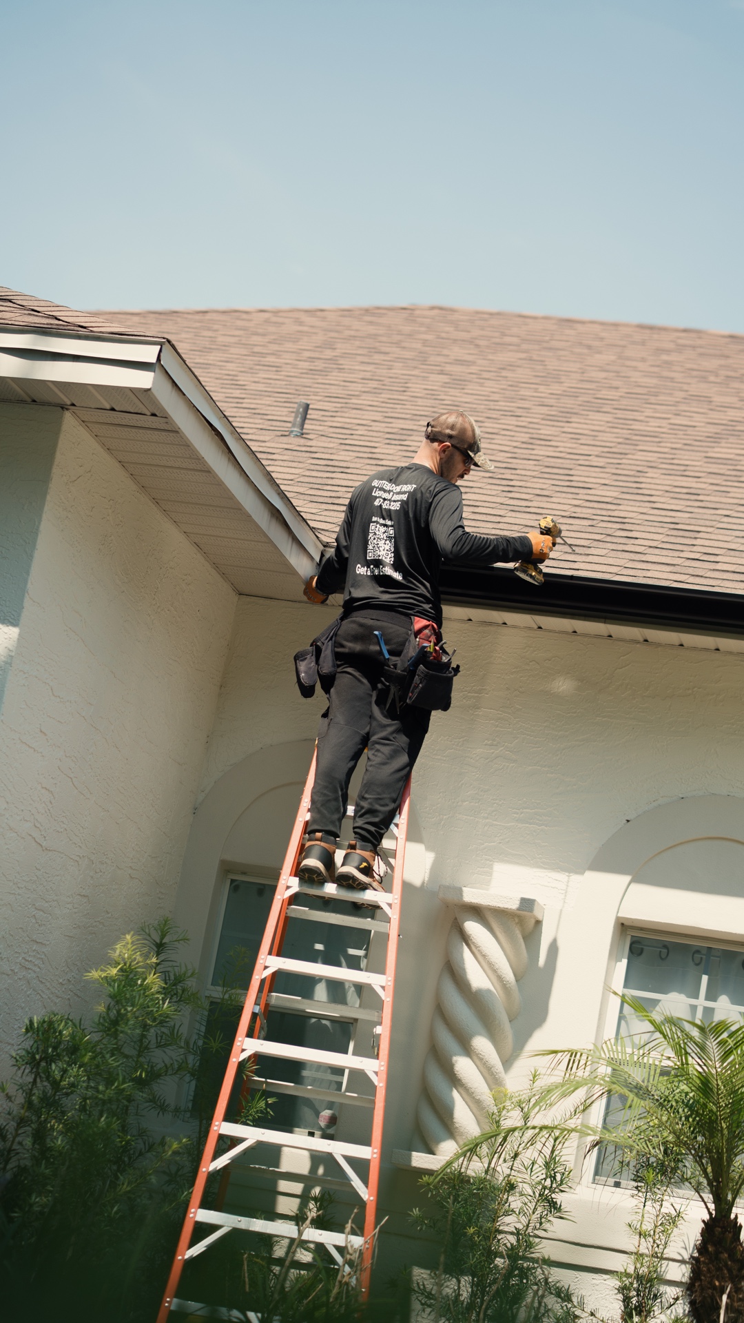 PrimeFlow installer working from a ladder